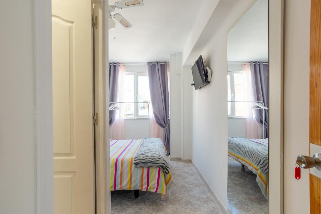 Postel nebo postele na pokoji v ubytování Rooms Breeze & Sun