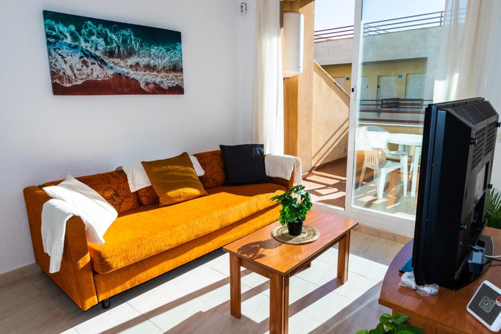 O zonă de relaxare la Apartamento Sereno 5 - Piscina, Garaje, Terraza y Playa