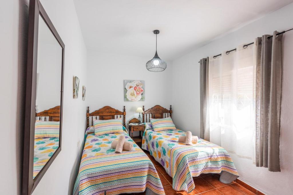 Posteľ alebo postele v izbe v ubytovaní Villa dos hermanas