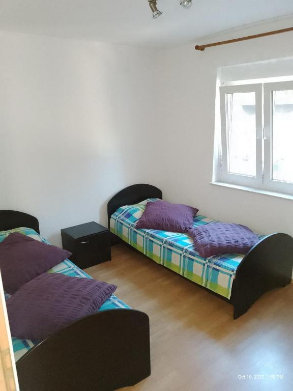 Posteľ alebo postele v izbe v ubytovaní Apartman Tomić - Copacabana Beach Okrug Gornji