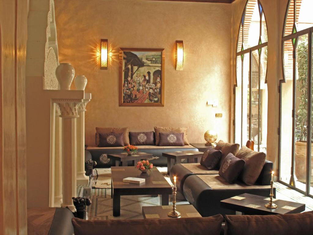 Posezení v ubytování Riad Le Perroquet Bleu Suites & Spa
