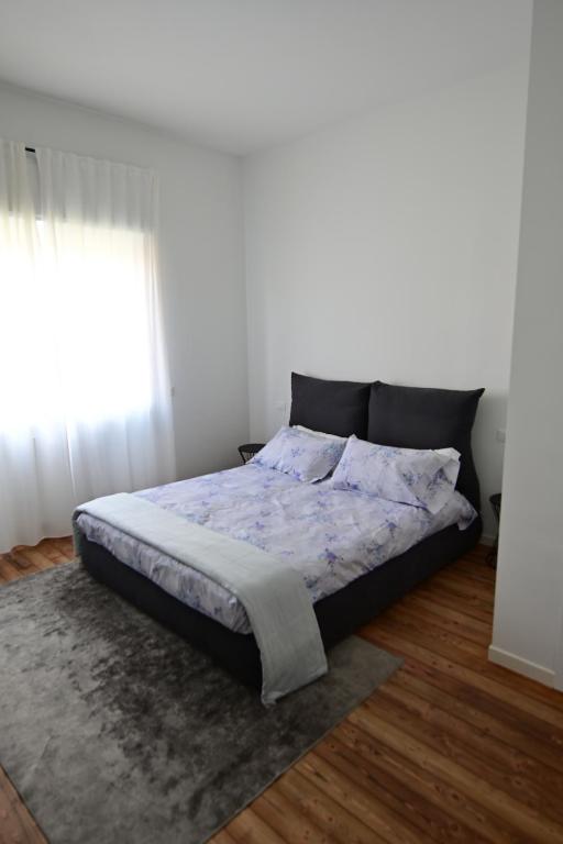 Postel nebo postele na pokoji v ubytování Suite Dalmine