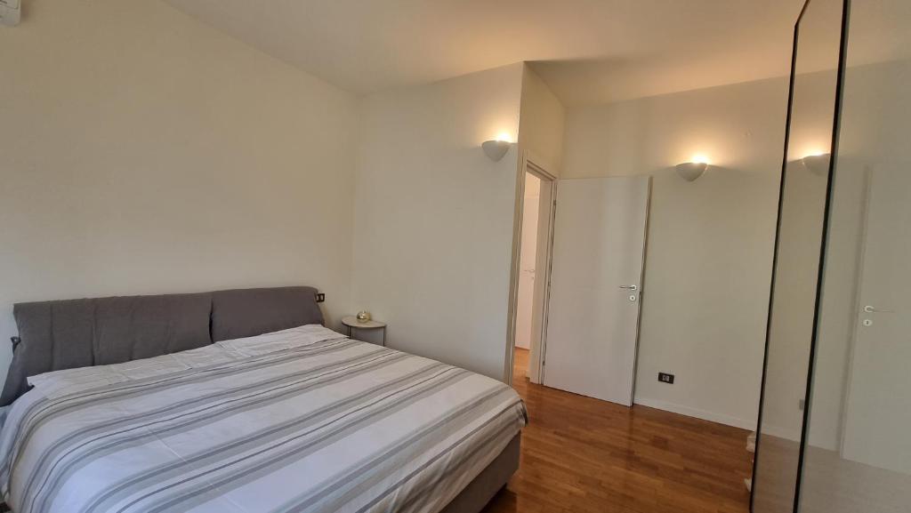 Postel nebo postele na pokoji v ubytování Suite Dalmine