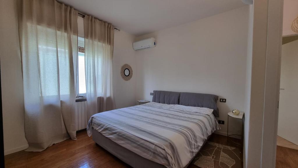 Postel nebo postele na pokoji v ubytování Suite Dalmine