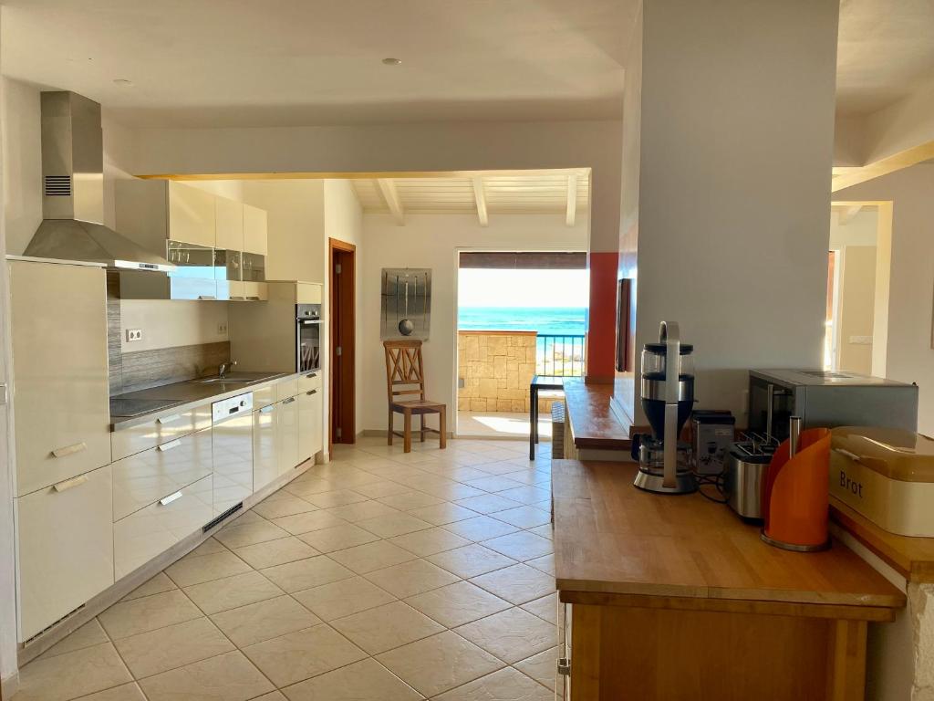 Kuchyň nebo kuchyňský kout v ubytování Seaview Luxury Penthouse Mare