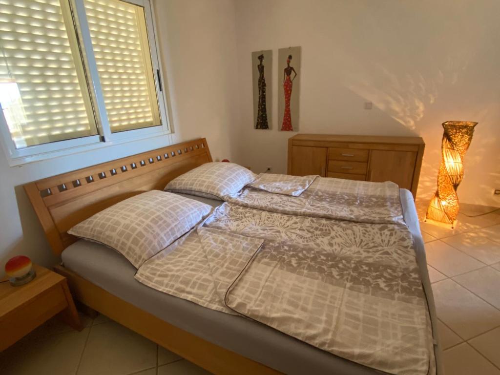 Postel nebo postele na pokoji v ubytování Seaview Luxury Penthouse Mare