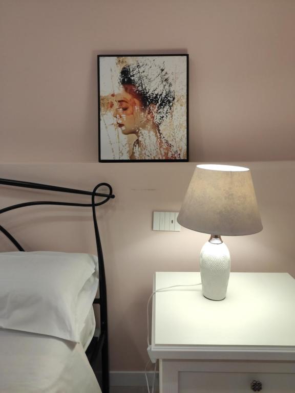 Postel nebo postele na pokoji v ubytování GArt Riviera B&B