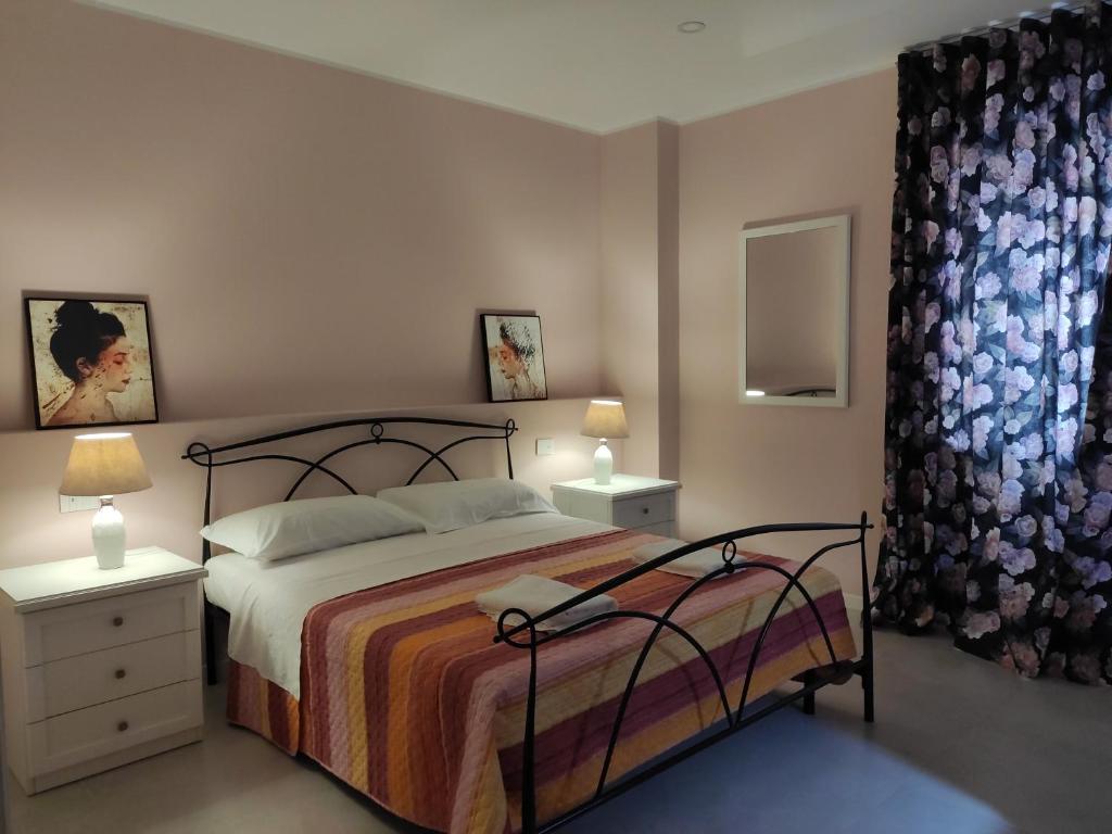 Postel nebo postele na pokoji v ubytování GArt Riviera B&B