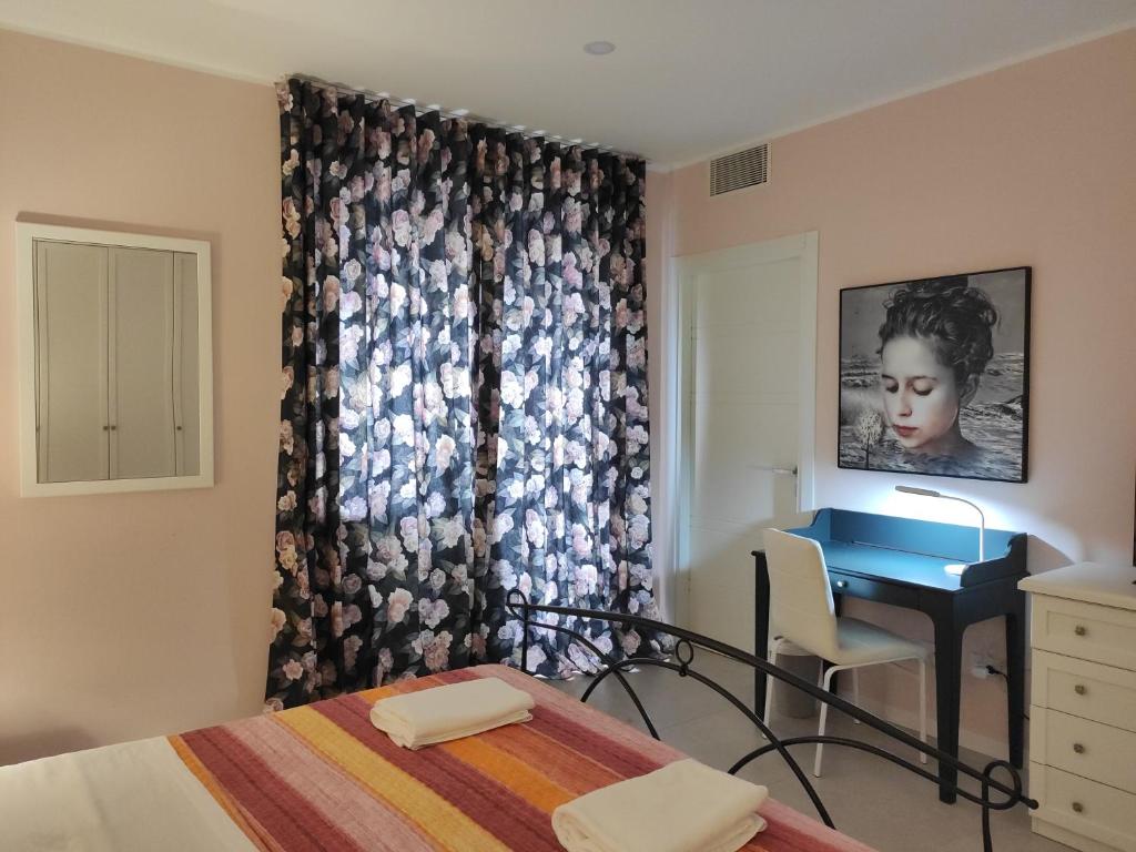 Postel nebo postele na pokoji v ubytování GArt Riviera B&B