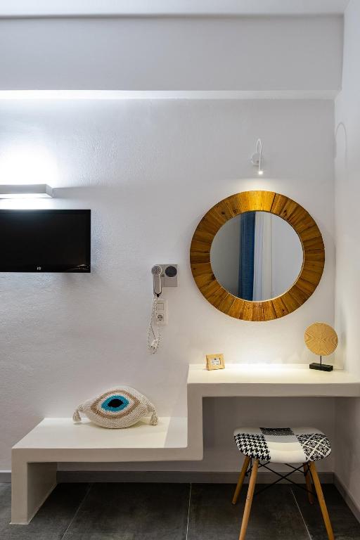 TV a/nebo společenská místnost v ubytování Dilion Hotel