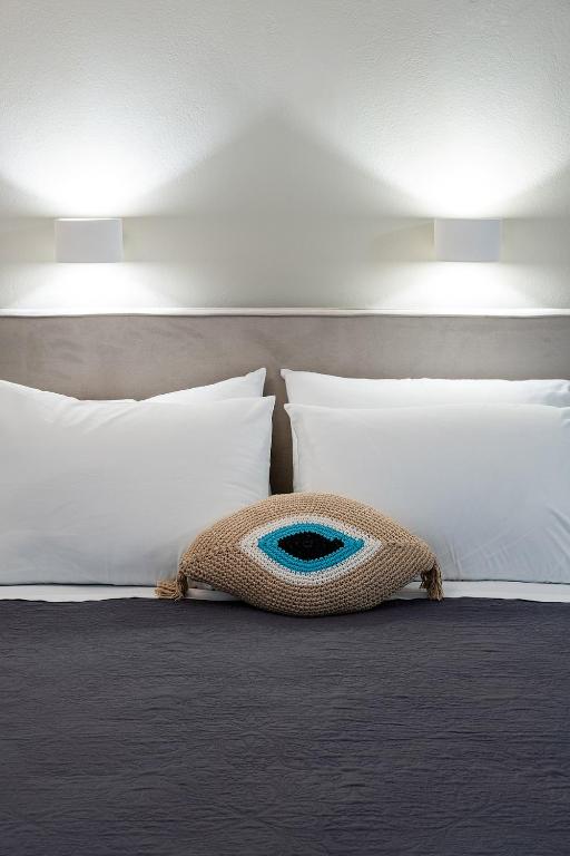 Postel nebo postele na pokoji v ubytování Dilion Hotel