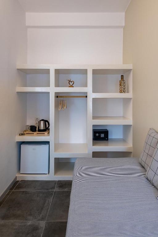Postel nebo postele na pokoji v ubytování Dilion Hotel