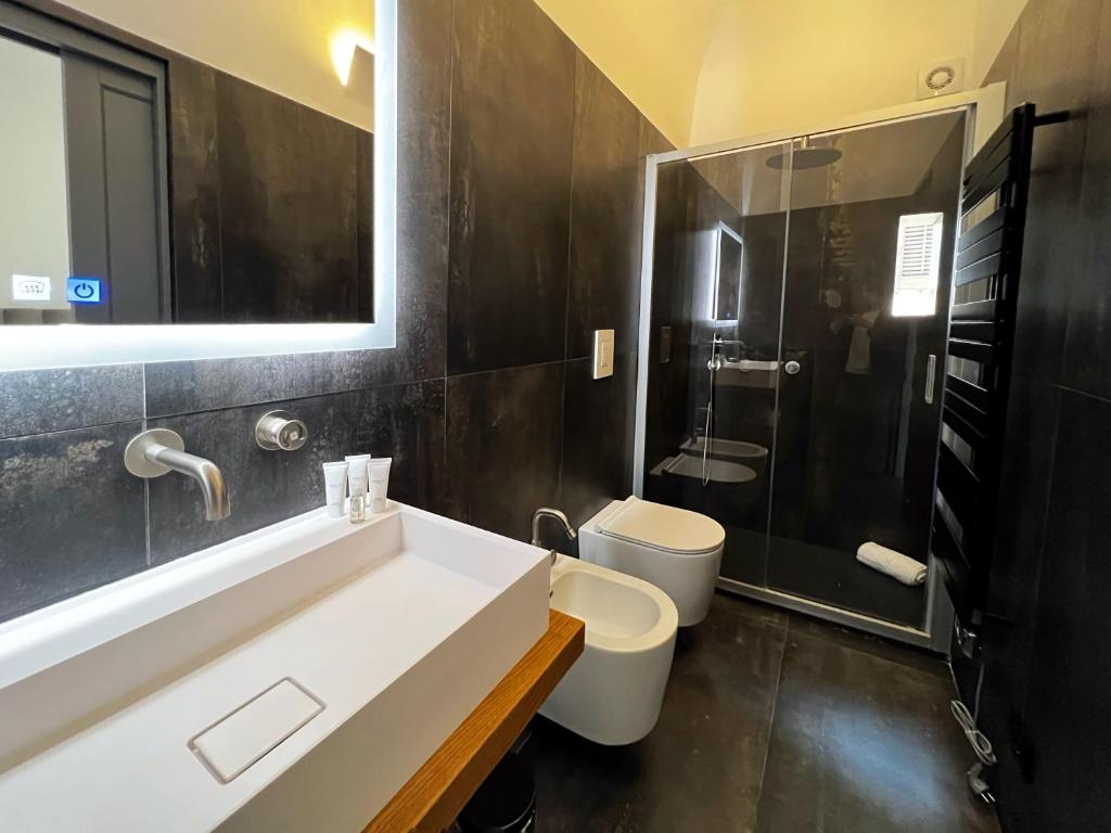 Koupelna v ubytování Gioiamia - Luxury Rooms in Cattedrale