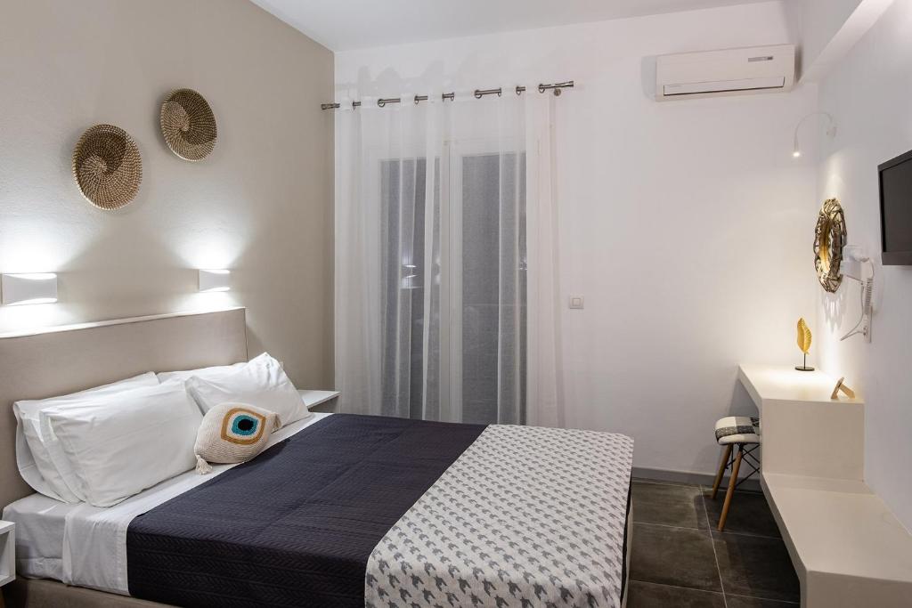 Postel nebo postele na pokoji v ubytování Dilion Hotel