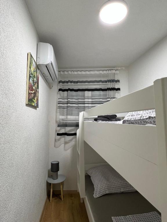 Postel nebo postele na pokoji v ubytování Apartments Graz
