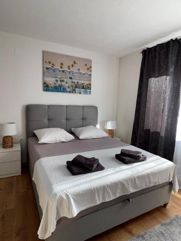 Postel nebo postele na pokoji v ubytování Apartments Graz