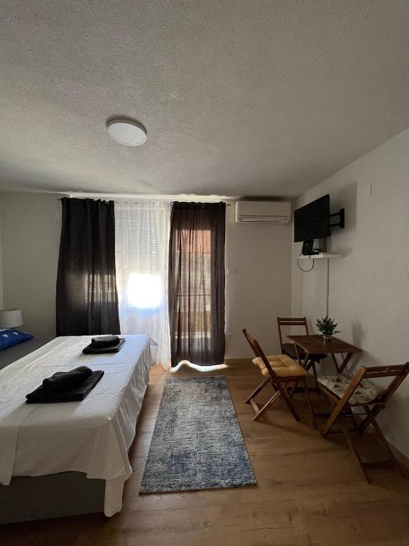 TV a/nebo společenská místnost v ubytování Apartments Graz