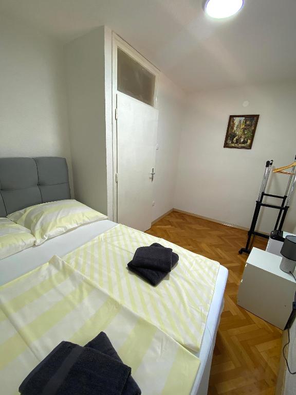 Postel nebo postele na pokoji v ubytování Apartments Graz