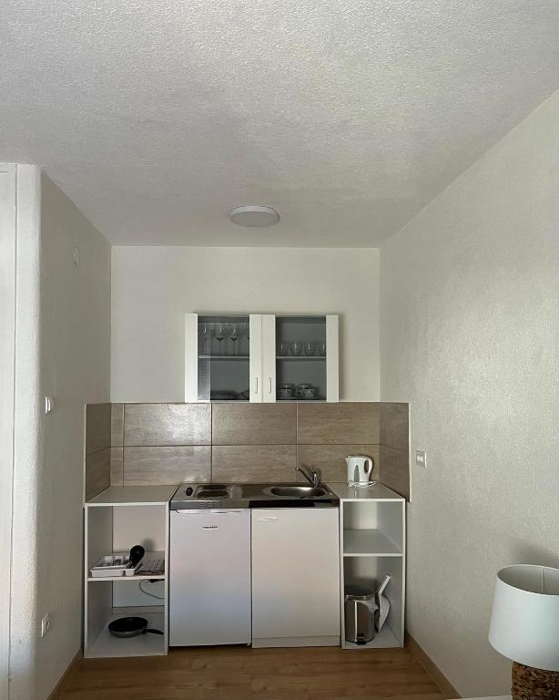 Kuchyň nebo kuchyňský kout v ubytování Apartments Graz