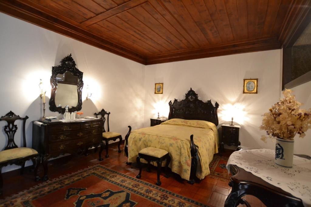Postel nebo postele na pokoji v ubytování Paço de Calheiros - Turismo de Habitação