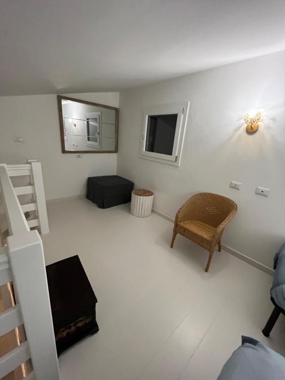 Posezení v ubytování Chalet del mare