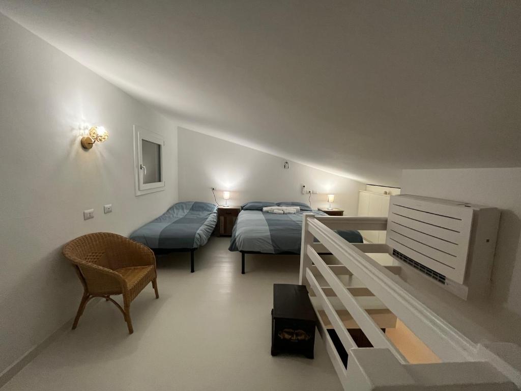 Postel nebo postele na pokoji v ubytování Chalet del mare