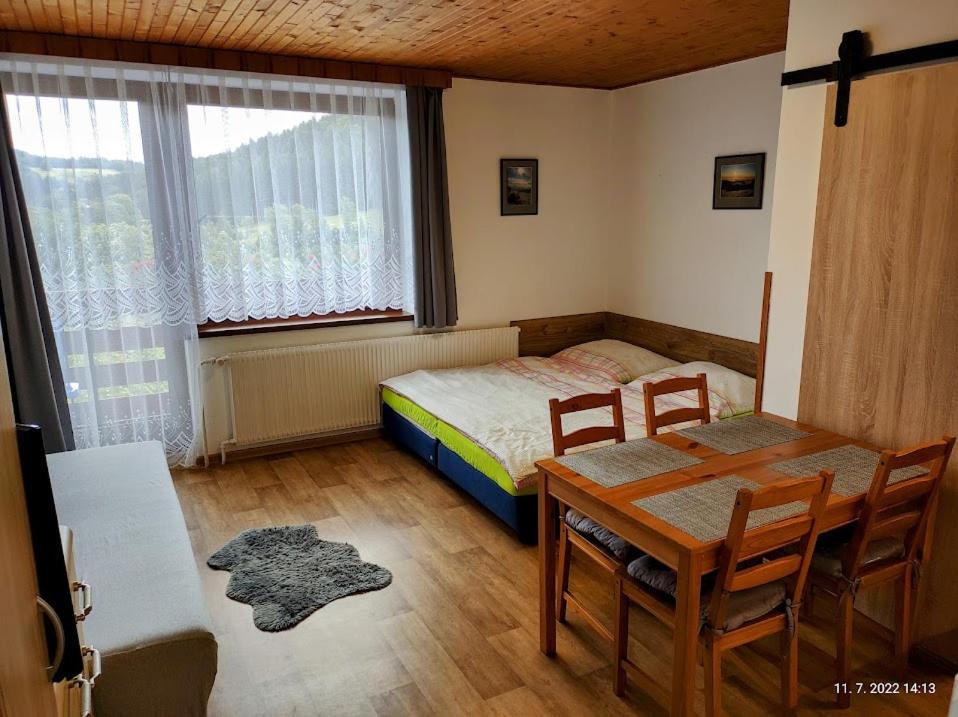 Postel nebo postele na pokoji v ubytování Penzion Daniela