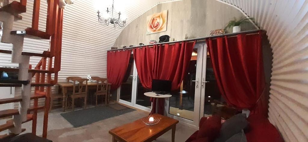 Posezení v ubytování Sallys Cabin