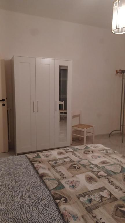 A bed or beds in a room at Casa Melograno