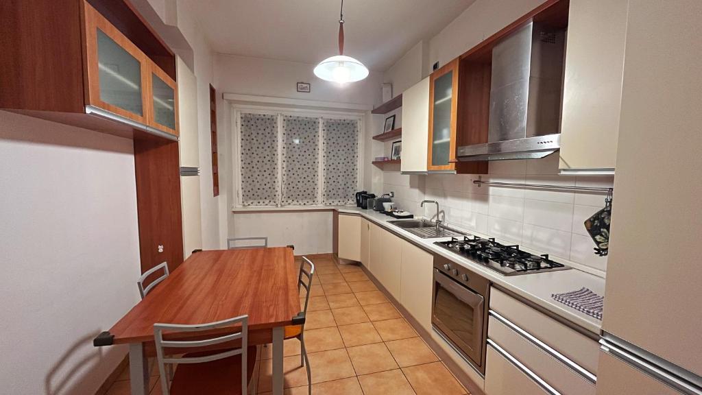 A kitchen or kitchenette at FG St Peter's Suites