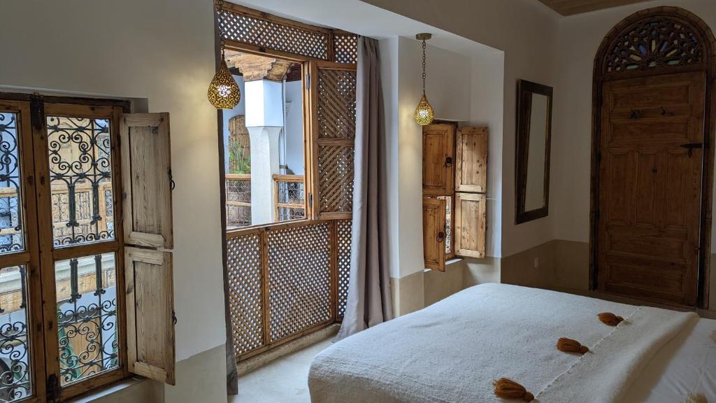 Uma cama ou camas num quarto em Riad Dar Eternity
