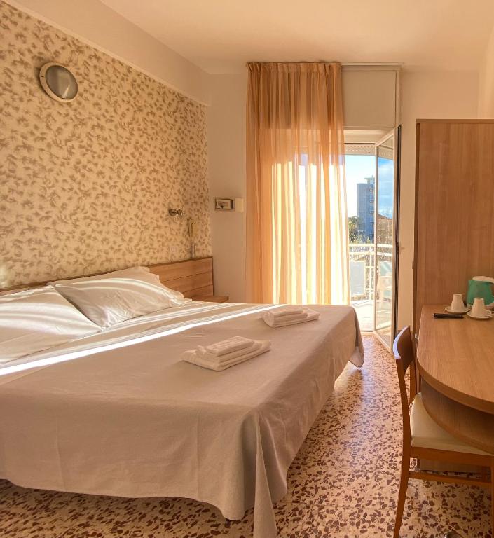 Postel nebo postele na pokoji v ubytování Hotel Ravello Adults Only