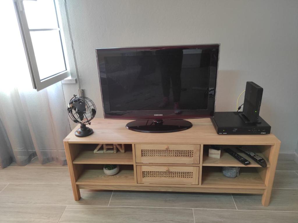TV a/nebo společenská místnost v ubytování Casa da Guida