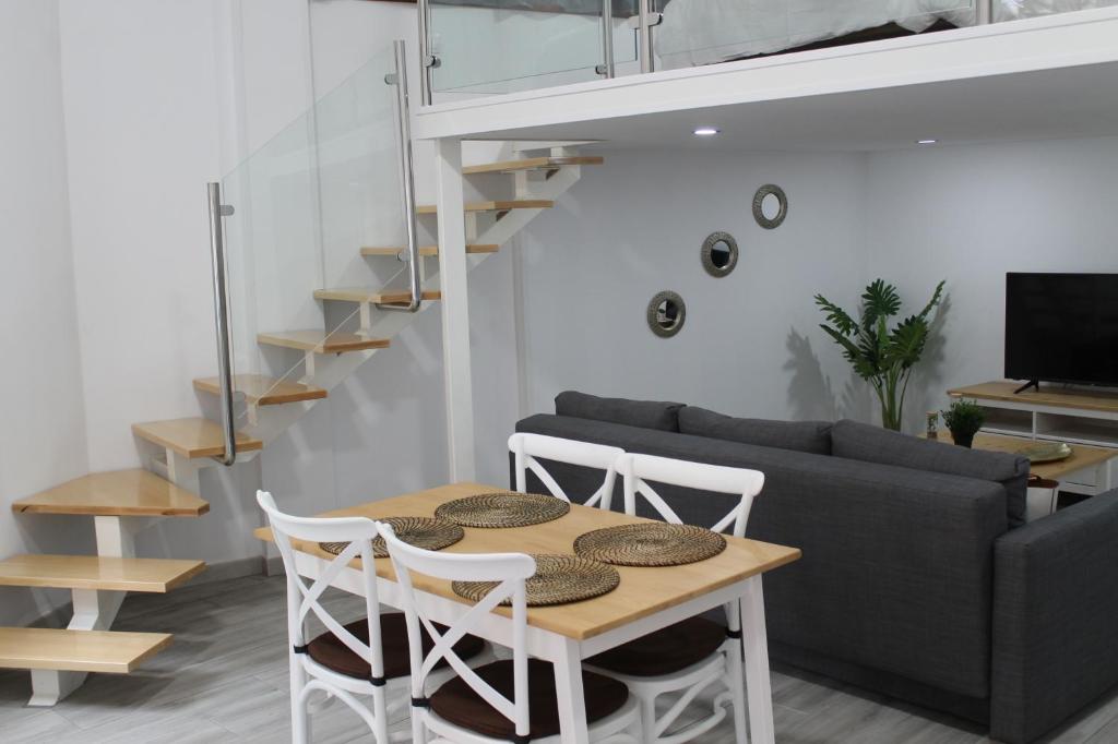 Posedenie v ubytovaní Apartamentos los Nidillos