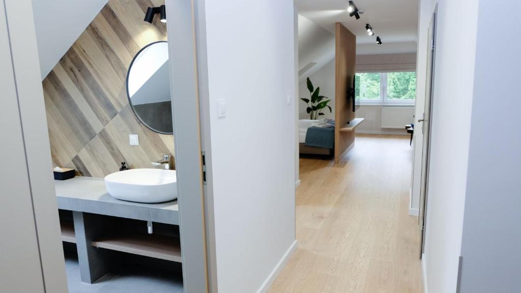 Postel nebo postele na pokoji v ubytování Hotel Rezydencja AS & Spa-Najwyżej w Karpaczu