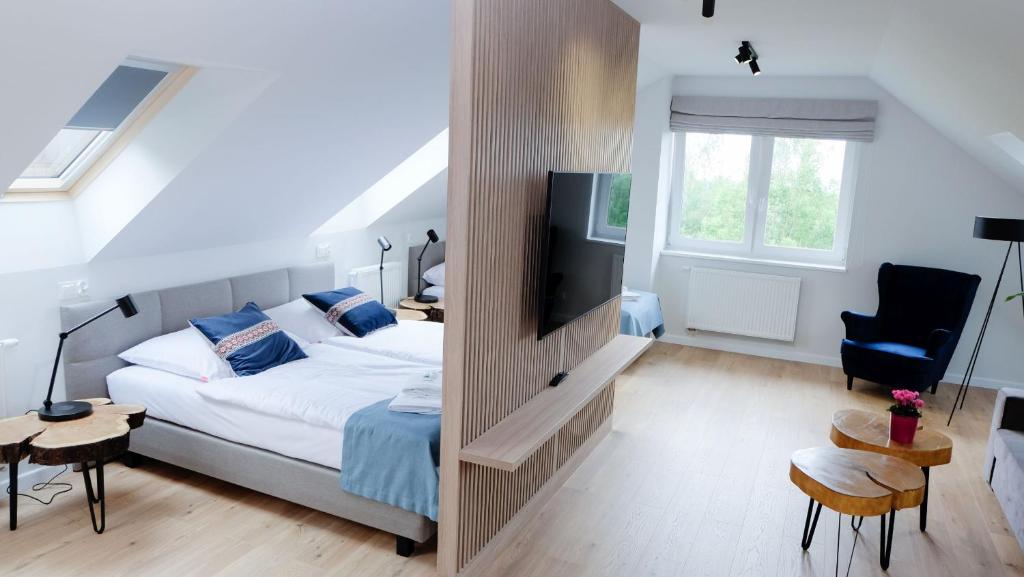 Postel nebo postele na pokoji v ubytování Hotel Rezydencja AS & Spa-Najwyżej w Karpaczu
