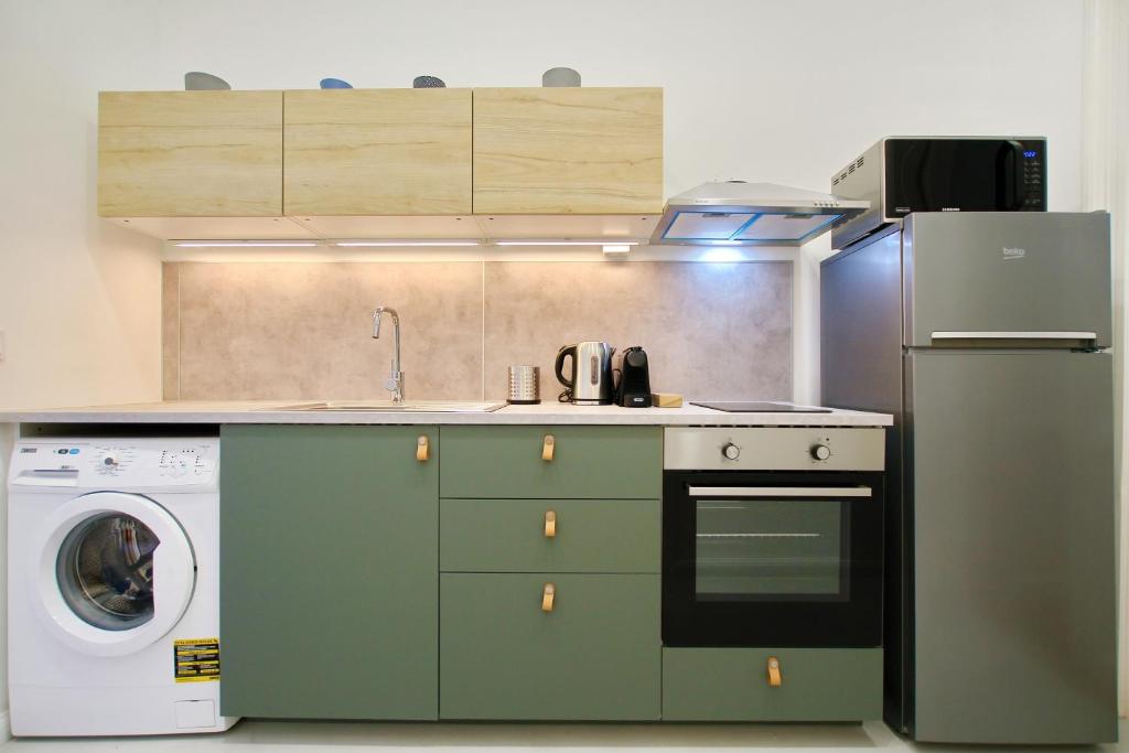 Kuchyňa alebo kuchynka v ubytovaní PAU Stylish studios in the heart of Budapest