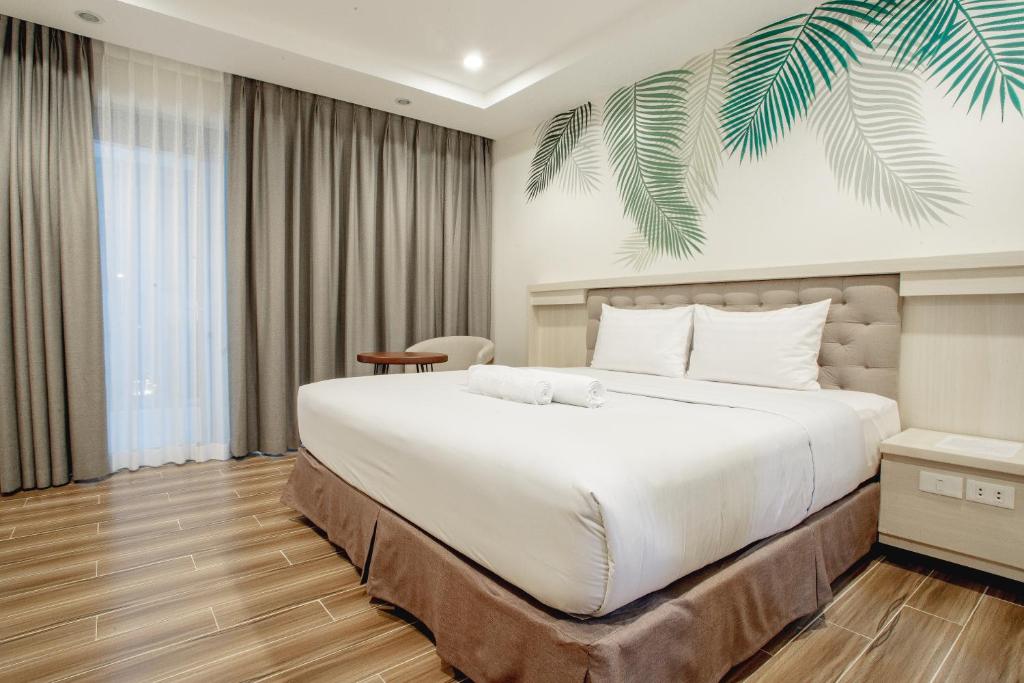 Postel nebo postele na pokoji v ubytování Ora Beach Resort