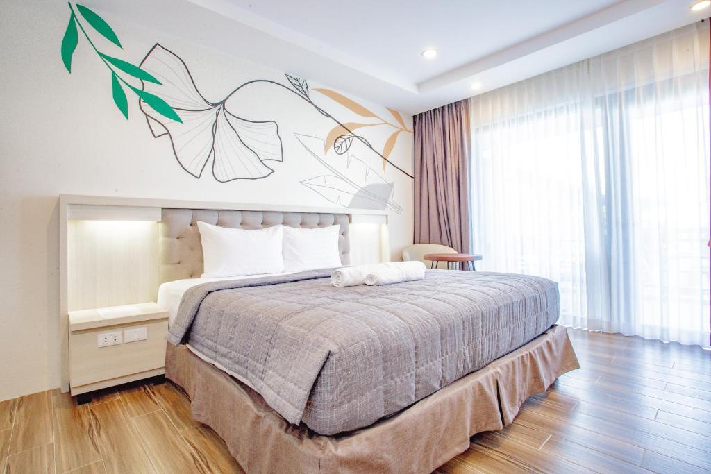 Postel nebo postele na pokoji v ubytování Ora Beach Resort