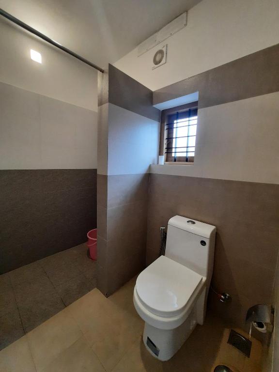 Koupelna v ubytování Oriole Homestay