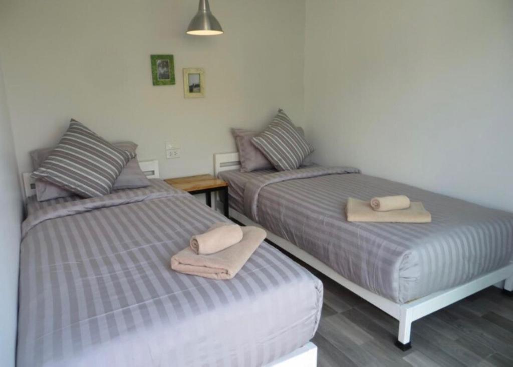 Postel nebo postele na pokoji v ubytování Non Du Lay Guesthouse