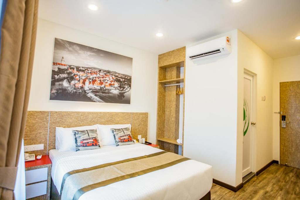 Postel nebo postele na pokoji v ubytování Natura Hotel
