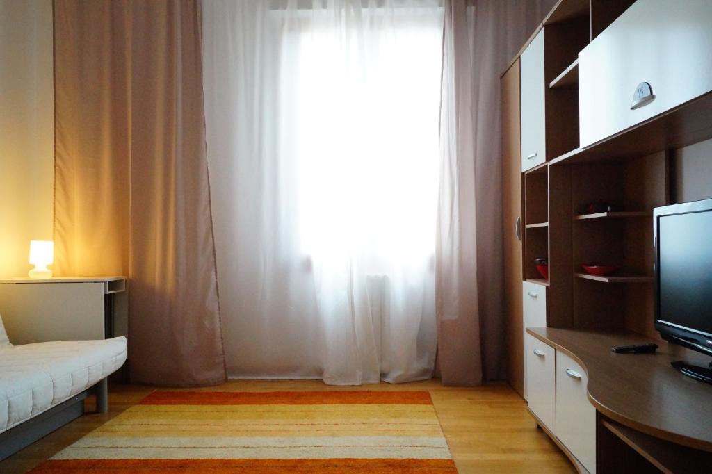 Cama o camas de una habitación en Appartamento Mirandola