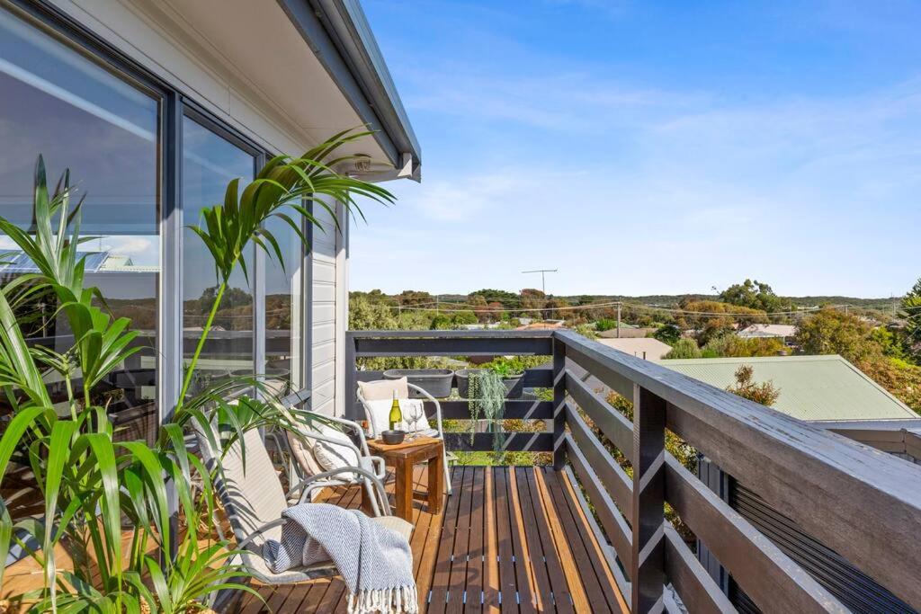 a balcony with a view of the ocean at Ocean mist - 3 bdrm, pet friendly, close to beach in Ocean Grove