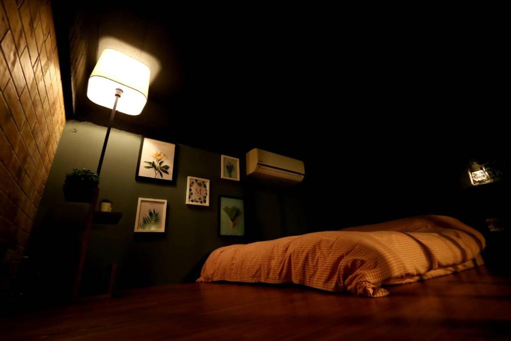 Postel nebo postele na pokoji v ubytování PENGHU Lucai B&B 旅采民宿