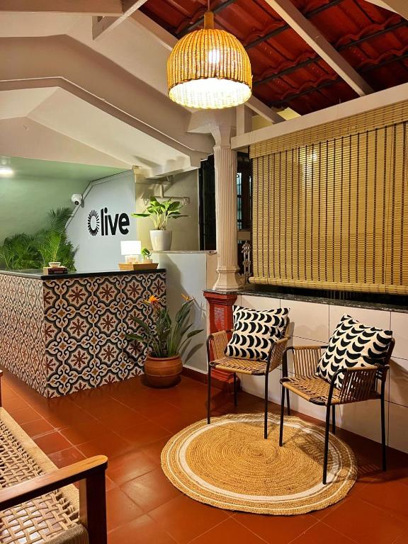 Posezení v ubytování Olive Hotel Calangute Niwasa by Embassy Group