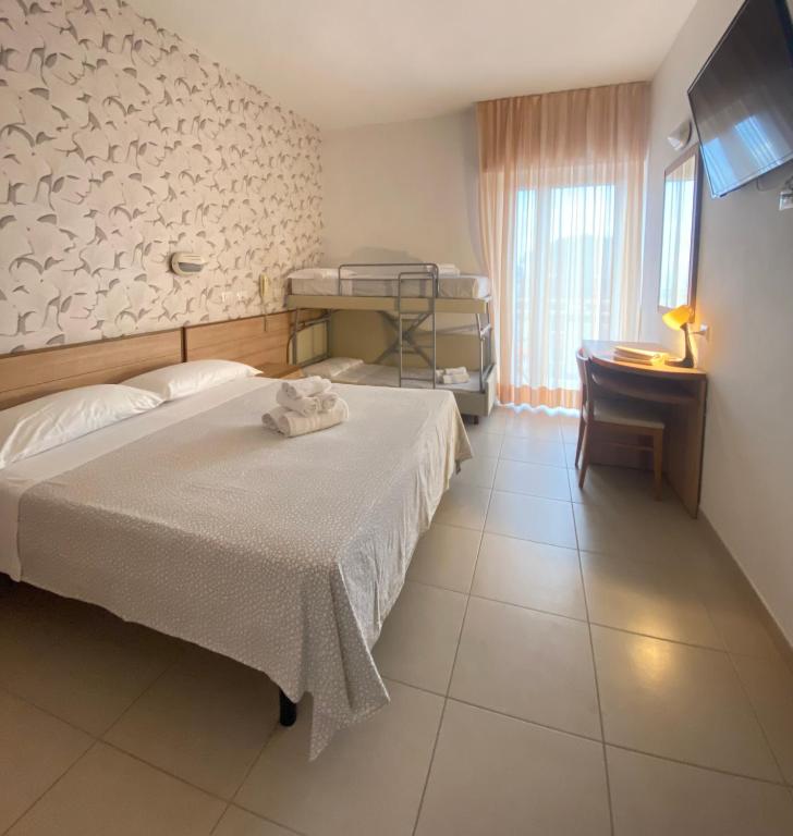 Postel nebo postele na pokoji v ubytování Hotel Ravello Adults Only
