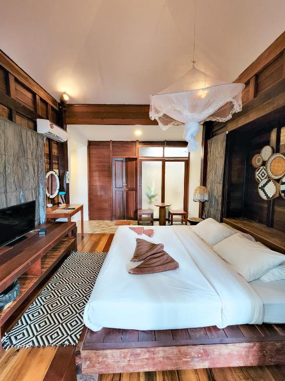 Postel nebo postele na pokoji v ubytování Koh Kood Resort