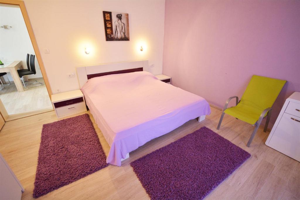 Posteľ alebo postele v izbe v ubytovaní Apartments Dubas