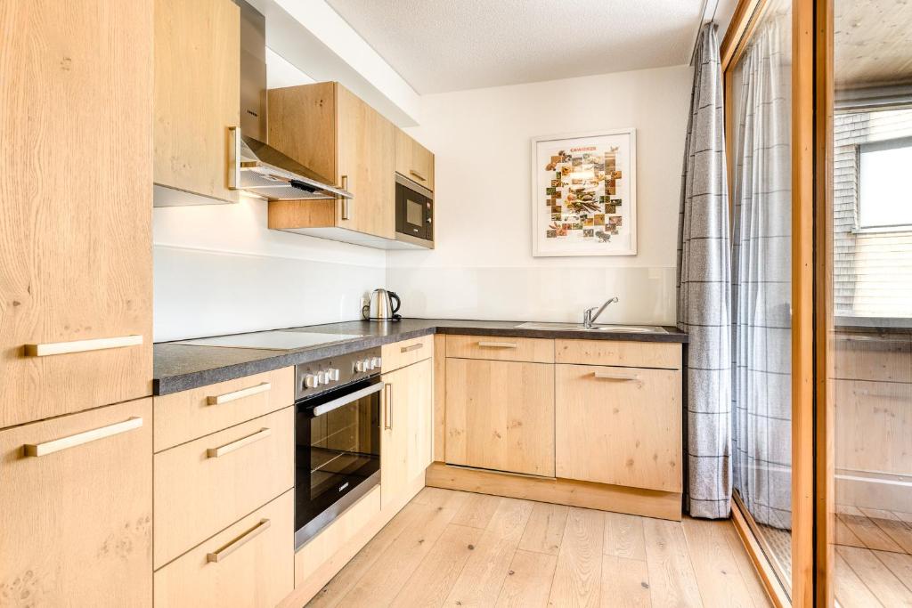 Kuchyň nebo kuchyňský kout v ubytování Appartements im Kirchberg by A-Appartments